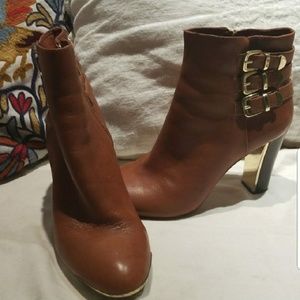 Used brown leather boots